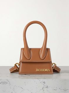 JACQUEMUS Le Chiquito mini leather tote Jacquemus Le Chiquito, Bottega Veneta Cassette, Jacquemus Bag, Leather Weekender Bag, Leather Clutch Bags, Medium Tote, Metal Logo, Small Shoulder Bag, Weekender Bag