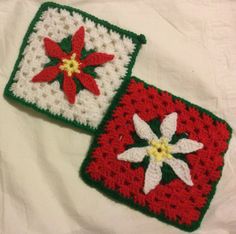 two crocheted squares with poinsettis on them