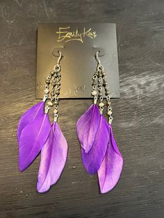 These stunning feather earrings make a big impact and are so lightweight! Perfect for sensitive ears, all Emily Kai earring feature sterling silver hooks. The feather earrings feature a rosary style strand of genuine gemstones. Fairy School, Diy Feather, Purple Feather, Natural Art, Feather Jewelry, Feather Earrings, Sensitive Ears, Jewelry Tutorials, Making Jewelry