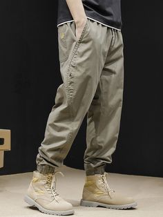 Men's ins Harem Bound Feet Cargo Pants
Features：

 	Product ID:CP0061
 	Material:Cotton
 	Season:Spring,Summer,Autumn,Winter
 	Color:Dark Gray,Black,Khaki

Size Chat： Urban Style Khaki Bottoms For Winter, Urban Style Khaki Winter Bottoms, Casual Khaki Bottoms For Winter, Casual Gray Sweatpants For Outdoor, Urban Style Khaki Pants For Summer, Casual Gray Tapered Leg Chinos, Casual Gray Parachute Pants For Fall, Casual Khaki Parachute Pants For Outdoor Activities, Casual Baggy Bottoms For Outdoor Activities