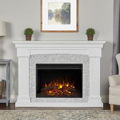 The Deland Grand electric fireplace is certain to become the focal point of any room. This fireplace features the Real Flame Grand Series firebox, which is 30% larger than our standard firebox and has incredible realism and clarity. The Deland is available in white with gray resin surround and gray with black wood surround. Real Flame 63-in W White Free Standing Fan-forced Flat Wall Electric Fireplace with Remote Control Included | 8290E-W White Electric Fireplace, Infrared Fireplace, Wall Mount Electric Fireplace, Electric Fireplace Insert, Real Flame, Fireplace Remodel, Indoor Fireplace, Home Fireplace, Fireplace Makeover