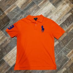 Nice Ralph Lauren Polo Shirt. New Without Tags, Had Been Laundered. Comes From A Smoke And Pet Free Home. Polo Ralph Lauren Mens Shirts, Polo Shirt Design, Polo Shirt Colors, Ralph Lauren Polo Shirt, Ralph Lauren Polo Shirts, Ralph Lauren Mens, Shirts Black, Black And Orange, Ralph Lauren Polo