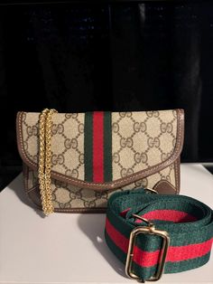 For Sale is This Gucci Web Sherry line Pouch Crossbody bag.Exterior Condition is very good canvas is in perfect condition some slight wear to upper corners.Interior lining is in excellent condition no stains.Snap button works perfectly.Great size bag Measures 7.7x5.1 inches i have an iphone 15 pro max with just a clear case on nothing bulky and it fits just fine inside.Modification done to the bag includes added non-gucci rivets added to each side of the bag to be able to use bag as a crossbody. Daily Use Monogram Canvas Bag With Phone Pocket, Daily Use Monogram Canvas Bag With Mobile Phone Pocket, Elegant Monogram Canvas Belt Bag, Luxury Green Canvas Shoulder Bag, Monogram Canvas Mobile Phone Bag For Travel, Elegant Green Shoulder Bag With Leather Trim, Brown Coated Canvas Mobile Phone Bag, Designer Monogram Canvas Crossbody Belt Bag, Monogram Canvas Belt Bag With Detachable Strap