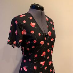 New With Tags, But Has Been Untouched In My Closet For A Few Years. Sweet And Flowy V-Neck, Mid-Length Dress With Short Sleeves. Black With Pink Floral Pattern. Very Slight Stretch. Wrinkles Steam Out Easily. Henley Sweater, White Cotton Dress, Dress With Short Sleeves, Midi Slip Dress, Pink Floral Pattern, Ruffle Sleeve Dress, Striped Midi Dress, Chambray Dress, Gap Dress