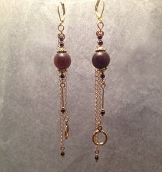 Simple yet exotic, long mix of beads, findings, and gold-plated curb chain make these earrings a unique addition to your accessories collection! Neutral tones mean they work with any outfit. Dress up with them for the evening or wear them on the weekend with your favorite jeans! Item #EMB-111008-9 Bead Earring, Outfit Dress, Accessories Collection, Chain Earrings, Curb Chain, Neutral Tones, Jewelry Trends, Favorite Jeans, Beaded Earrings