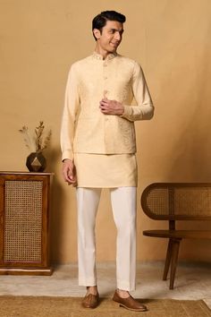 Yellow bundi with thread embroidered floral motifs and placed sequin bead embellishments. - Aza Fashions Cocktail Reception, Nehru Jackets, Beaded Neckline, Kurta With Pants, Sequin Beading, Pants Pattern, Floral Motifs, Mandarin Collar, Aza Fashion