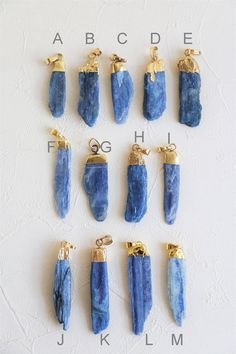 Crystal necklace of blue kyanite, dipped gold. Size of blue kyanite: A 35mm B 43mm C 40mm D 36mm E 45mm F 50mm G 44mm H 44mm I 45mm J 50mm K 51mm L 55mm M 50mm Length of necklace: Can be chosen from 14-30 inches Metal Component: 18 k gold plated, made of brass. The price is for one necklace. One of a kind item. Please choose your favourite pendant while check out. Thanks. ﹎﹎﹎﹎﹎﹎﹎﹎﹎﹎﹎﹎﹎﹎﹎﹎﹎﹎﹎﹎﹎﹎ ▲ Care instruction: Please remove it before bathing or swimming. Avoid your jewelry touching chemical Raw Quartz Necklace, Kyanite Necklace, Cotton Jewelry, Raw Crystal Necklace, Raw Quartz, Blue Kyanite, Necklace Gemstone, Necklace Blue, Shipping Company