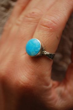 Silversmith elegant  turquoise ring is elegant silver ring for woman, good gift for wife. Navajo ring with round stone. Painted turquoise. Sterling silver Choose your size in variations. 5 US-15,75 mm 5 ½ US-16 mm 6US-16,5 mm 6 ½ US-17 mm 7US-17,25 mm 7 ½ US-17,75 mm 8US-18 mm 8 ½US-18,5 mm 9US-19 mm 9 ½US-19,5 mm 10US-20 mm 10 ½US-20,25 mm 11US-20,75 mm 11 ½US-21 mm 12US-21,25 mm If you have any questions-contact me. There are matching earrings for this ring here https://www.etsy.com/listing/14 Handmade Turquoise Wedding Ring, Bohemian Opal Ring With Natural Stones, Bohemian Round Opal Ring With Natural Stones, Stamped 925 Turquoise Ring For Wedding, Wedding Turquoise Ring Stamped 925, Turquoise Ring Gift, Elegant Round Turquoise Ring With Natural Stones, Handmade Turquoise Sterling Silver Ring, Bohemian Turquoise Round Ring For Anniversary