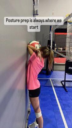 a woman leaning against a wall with her volleyball ball on it's back and the words posture prep is always where we start