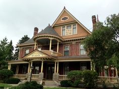 a large house with many windows and balconies