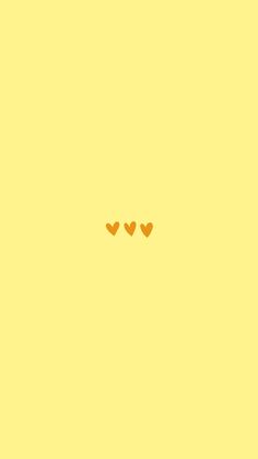 two hearts are drawn in the middle of a yellow background