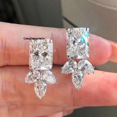 Radiant Cut & Pear Cut Moissanite Diamond Cluster Earrings, Stud Tear Drop Cluster Wedding Earrings, 18k White Gold Antique Bridal Earrings ✹✹𝐖𝐞𝐥𝐜𝐨𝐦𝐞 𝐭𝐨 𝐂𝐫𝐚𝐳𝐲𝐃𝐢𝐚𝐦𝐨𝐧𝐝𝐬𝐂𝐨✹✹ Detail about stones Moissanite & Simulated Stone: ----------------------------- Stone Shape: Radiant Cut & Pear Cut Stone Size: 10X8 mm & 6X4 mm Weight: 10 TCW Color: Colorless Cut: Excellent Clarity: VVS ★ 𝑰𝒕𝒆𝒎 𝑫𝒆𝒕𝒂𝒊𝒍𝒔:- ☛ Metal Purity: Solid Gold (10KT, 14KT, 18KT); Silver(925 Sterling, 935 Luxury Sterling Silver Radiant Cut Earrings, Luxury Moissanite Earrings For Gift, Luxury Moissanite Earrings As Gift, Luxury Diamond Cut Teardrop Earrings Gift, Luxury Moissanite Diamond Drop Earrings, Luxury Moissanite Fine Jewelry Earrings, Luxury Dazzling Teardrop Earrings, Luxury Diamond Cut Teardrop Earrings As Gifts, Luxury Radiant Cut Sterling Silver Diamond Earrings