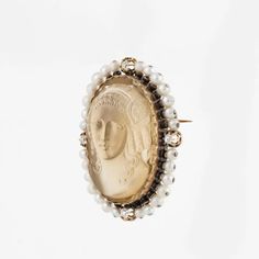 For Sale on 1stDibs - Large carved citrine cameo pin. Frame is 18K rose gold holding 28 seed pearls and four (4) round diamonds totaling 0.50 carats. Measures 1-5/16' long, Luxury Yellow Gold Cabochon Brooches, Luxury Cabochon Brooch, Luxury Round Cabochon Brooch, Luxury Round Cabochon Brooches, Luxury Yellow Gold Cameo Brooch, Luxury Oval Cabochon Brooches, Elegant Yellow Gold Baroque Brooches, Elegant Intaglio Brooches For Gifts, Elegant Formal Brooch With Intaglio Detail