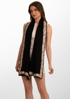 This classic black scarf is woven from a luxurios wool and silk blend. It features a striking multi-color embroidery appliquŽ border that is further enveloped with a fine black lace detailing. The embroidery adds a touch of sophistication whilst the exquisite lace detailing makes this scarf a must-have accessory for the fashion-forward individual. Wrap yourself in style and make a bold fashion statement with this versatile scarf that seamlessly blends warmth with artistic flair. Multicolor Embroidery, Color Embroidery, Black Scarf, Lace Border, Bold Fashion, Embroidery Applique, Black Wool, Silk Scarf, Lace Detail