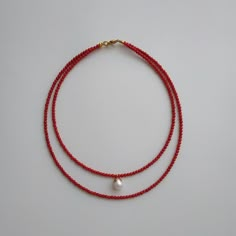 < Red coral necklace with pearl pendant > This product made according to the model of authentic traditional Ukrainian jewelry. The coral is modern, the design is vintage. Like 99% of the coral on the market these days, this coral has been dyed. I use bamboo coral which is not endangered or threatened in any way, unlike natural pink or red coral (the production of which is forbidden almost everywhere in the world). Bamboo coral doesn't mean it's not organic. Every bead of it has a distincti