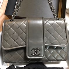 New With Tags (Not Attached) Grey Chanel Flap Bag. Used 3-4 Times. Comes With Box, Bag, Authenticity Card, And Receipt. Bought From Chanel At Saks In St Louis. Price Is Firm. No Trades! Luxury Office Bag With Double Flap, Luxury Flap Bag With Removable Pouch For Shopping, Luxury Shopping Flap Bag With Detachable Strap, High-end Double Flap Shopping Bags, High-end Double Flap Shoulder Bag With Removable Pouch, High-end Shoulder Bag With Double Flap And Removable Pouch, High-end Shoulder Bag With Removable Pouch And Double Flap, High-end Double Flap Shoulder Bag For Shopping, High-end Double Flap Bag For Shopping