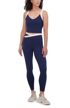 A contrast crossover waistband brings sporty-chic style to smooth moisture-wicking leggings cut in an ankle-length silhouette. 25" inseam; 4" leg opening; 10 1/4" front rise; 11" back rise Elastic waist Moisture-wicking fabric engineered for dryness and comfort 80% nylon, 20% spandex Machine wash, tumble dry Imported Sporty Chic Style, Black Iris, Sporty Chic, Moisture Wicking Fabric, Ankle Length, Crossover, Moisture Wicking, Nordstrom Rack, Chic Style