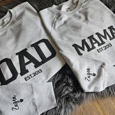 Mama Sweatshirt  Looking for some new apparel?  Choose something from our collection.  You will find here clothing for mom, dad, grandparents, uncle, friends and other :)  If you have an idea for a t-shirt or hoddie contact us and we make a custom order Products are made to order.  Every print is design and handmade by our team :) Print on this sweatshirts is made with strong and resistant transfer puff foil.   The listing is for one item If you want matching sweatshirt put 2 sweatshirt to your Gray Graphic Print Fleece Tops, Family Matching Crew Neck Sweatshirt For Father's Day, Family Matching Crew Neck Sweatshirt With Graphic Print, Father's Day Long Sleeve Relaxed Fit Sweatshirt, Father's Day Family Matching Long Sleeve Tops, Father's Day Cotton Sweatshirt With Name Print, Father's Day Cotton Crew Neck Sweatshirt, Long Sleeve Top With Text Print For Father's Day, Winter Crew Neck Sweatshirt With Name Print