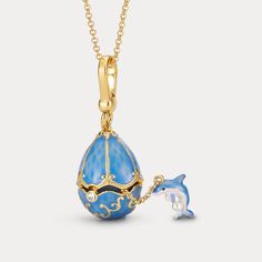 Dive into ocean wave with our Dolphin Egg Locket Necklace! 🐬 This enchanting piece features a playful dolphin embracing a delicate egg locket, creating a cute and endearing design. Perfect for ocean lovers, this necklace adds a touch of charm and marine magic to your style. Express your love for these intelligent creatures and make a splash with this delightful accessory! DETAILS Plating: 18K Gold Materials: 18K Gold on Brass, Enamel Measurements: Length:  24.80 "(63cm)  + Extender: 2.36"(6cm) Egg Necklace, Fish Jewelry, Pearl Gifts, Fish Necklace, Unique Gift Wrapping, Butterfly Gifts, Purple Grapes, Enamel Necklaces, Ocean Wave