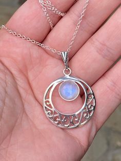 "Big and beautiful, natural rainbow moonstone pendant Necklace In 925 Sterling Silver, with 18\" inches long sterling silver chain. Chain's not adjustable. Pendant size: 1.70\" x 1.10\" inches, approx. Stone size: 10 mm around, round cabochon cut." Nickel Free Moonstone Necklaces, Silver Moonstone Moon Necklaces, Bohemian Moonstone Round Necklaces, White Moon Phase Necklace In Sterling Silver, White Moon Phase Sterling Silver Necklace, White Sterling Silver Moon Phase Necklace, Silver Moonstone Round Necklace, White Moonstone Round Pendant Necklace, Spiritual Silver Moonstone Necklace