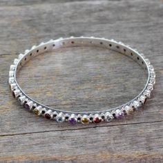 Amethyst Topaz Citrine and Garnet Silver Bangle Bracelet - Multicolor Energy | NOVICA Blue Topaz Bracelet, Silver Bangle Bracelet, Sterling Silver Dangle Earrings, Silver Bangle Bracelets, Silver Bangle, Delicate Rings, Hand Made Jewelry, Jewelry Packaging, Sterling Silver Bracelet