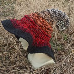 a knitted hat sitting on top of a mannequin head