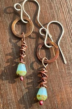 Handmade artisan boho oxidised copper and blue glass dangle earrings with handmade silver ear wires Dangly Earring, Oxidised Copper, Copper And Blue, Dangly Earrings, Handmade Artisan, Handmade Sterling Silver, Ear Wires, Blue Glass, Earrings Handmade