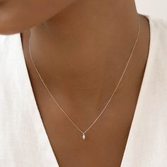 Featuring a marquise diamond drop on a dainty chain, the Aletta Necklace is an elegant and understated piece for any occasion. Crafted in 14k white gold. 


Lab grown diamond size: 2.2mm x 4.2mm

0.08 total carat weight 

Necklace can be worn at 16”, 17”, and 18” Minimalist White Gold Teardrop Pendant Diamond Necklace, Minimalist White Gold Teardrop Diamond Necklace, Minimalist Teardrop Necklace With Single Diamond, Minimalist Solitaire Necklace With Teardrop Diamond Cut Pendant, Dainty Diamond Necklace With Teardrop Accents, Dainty Teardrop Diamond Necklace With Accents, Teardrop Diamond Necklace In Diamond White, Teardrop Diamond White Diamond Necklace With Single Diamond, Teardrop Solitaire Necklace In White Gold With Single Diamond