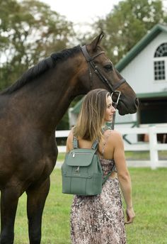 DESCRIPTION: THE PERFECT BAG FOR EVERYDAY A smaller version of our best-selling original Convertible Backpack Tote, the Mini also combines beauty and functionality to provide you with two styles in one. When worn as a backpack, it's perfect for everyday essentials, handsfree style, and function. The practical front clip ensures that everything will be safely tucked away inside, and the custom tooled hardware is as beautiful as it is functional. Like the original, The Mini Convertible Backpack To Mini Convertible, Backpack Tote, Convertible Backpack, Equestrian Style, Perfect Bag, Everyday Essentials, Tote Backpack, Equestrian, Everyday Essentials Products