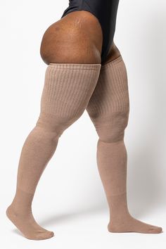 Elevate your spring wardrobe with our Timeless Taupe Thunda Tubbies. This classic and versatile shade of taupe adds sophistication to any outfit, while the lightweight cotton blend ensures all-day comfort and breathability. Whether you're dressing up or keeping it casual, these thigh highs are a timeless choice for every occasion. s i z i n g + m e a s u r e m e n t s Length: Heel to cuff 28 inches Recommended: For upper thighs that measure 24-35 inches l o o k a f t e r m e 80% Cotton, 10% Nylo Cozy Gift, Solid & Striped, Spring Wardrobe, Thigh Highs, Cotton Blend, Dress Up, Cuff, Wardrobe