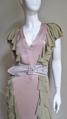 For Sale on 1stDibs - A very pretty feminine dress in dusty pink silk charmeuse with olive ruffles from Stella McCartney. The color combination is beautiful. It is a simple Silver Silk Dress, Stella Mccartney Dresses, Bandage Dress Black, One Sleeve Dress, Blue Silk Dress, Dress With Ruffles, Black Knit Dress, Feminine Dress, Silk Charmeuse