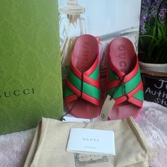 Gucci Rubber Web Womens Criss Cross Slide Sandals Coral New Shamarock. Available In Size 6 And 8. Brand New In A Box Comes With Two Dustbag And Care Card. This Is An Authentic Pair Of Gucci Rubber Web Womens Criss Cross Slide Sandals Size 38 In Coral And New Shamrock. These Stylish Sandals Are Crafted Of Red And Green Rubber. They Feature A Pink Rubber Bottom With A Crossover Band Of Gucci Classic Red And Green Web. Made In Italy Cute Slides, Green Web, Stylish Sandals, Care Card, Gucci Shoes, In A Box, Slide Sandals, A Box, Criss Cross