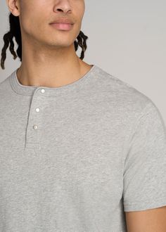 About Our Jersey Henley Tee for Tall Men The henley tee: effortless, comfortable and easy to style. An iconic wardrobe staple, it's high time there was a henley tee for tall men. This short sleeve is made with 100% jersey cotton that's incredibly soft and falls just right. Featuring our standard fit that's long enough for your torso without being baggy, it's a casual piece that goes with everything. Whether you pair it with chinos and jeans or your favorite joggers, you'll reach for this tall me Cotton T-shirt With Henley Neckline, Everyday Cotton Crew Neck Henley, Gray Cotton Henley Neckline Top, Casual Henley Neckline Tops With Relaxed Fit, Casual Henley Neckline Tops For Loungewear, Casual Cotton Crew Neck Henley, Casual Henley Neckline T-shirt, Casual Relaxed Fit Henley For Gatherings, Casual Henley Neckline Tops For Gatherings