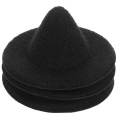 a black hat is sitting on top of a white surface and it's made out of wool