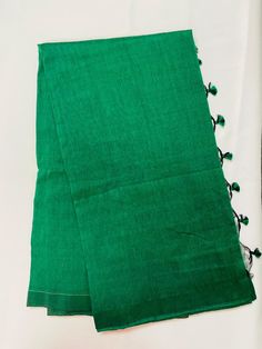 Pure Handloom Plain khhaadi Cotton Saree (in Bottle Green) with pure Cotton Rye Bandhini stitched blouse. Fall Peco Done. Extra Running Material Blouse piece included. Cotton Pre-draped Saree With Self Design For Festivals, Traditional Green Slub Silk Pre-draped Saree, Semi-stitched Cotton Blouse Piece With Pallu, Cotton Pre-draped Saree For Puja During Navratri, Festive Cotton Pre-draped Saree With Pallu, Cotton Pre-draped Saree With Unstitched Blouse For Puja, Traditional Cotton Pre-draped Saree With Zari Work, Unstitched Green Cotton Silk Choli, Traditional Green Tussar Silk Choli