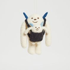 a stuffed animal hanging from a string