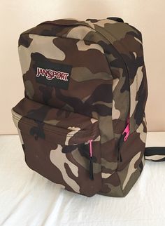 "Vintage Jansport camouflage backpack in good condition.  Some dark stain on the side about the size of a quarter.  But it looks like the camouflage design.   Depth: 5.5\" Length: 16.5\" Width: 12\" Free domestic shipping!" Casual Camouflage Bags For Outdoor Activities, Casual Travel Backpack In Camouflage, Casual Camouflage Travel Backpack, Casual Camouflage School Bag, Camouflage Travel Backpack, Camouflage Outdoor Backpack, Camouflage Outdoor Standard Backpack, Camouflage Backpack, Camouflage Design