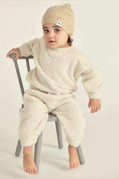 Cuddle up in these irresistibly cozy Boxy Lounge Pants! Made from 100% recycled materials, they're as comfy as can be, with a fuzzy feel that's perfect for the everyday. Unisex and cute, it's the perfect companion for little explorers.

Make it a set with the matching Boxy Sweater or mix and match with your favorite fuzzy tops. Wear at home and in your 7AM footmuff for the ultimate fuzzy experience. Cozy Soft Bottoms With Cozy Fit, Cozy Soft Pants For Winter, Soft Bottoms With Cozy Fit, Soft Texture Pants For Lounging In Winter, Cozy Soft Texture Winter Pants, Cozy Fit Pants With Soft Texture, Winter Cozy Fit Bottoms With Soft Texture, Cozy Fit Bottoms With Soft Texture For Winter, Cozy Fit Long Pants Bottoms