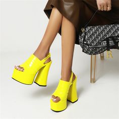 Bold Evening Sandals For Spring, Yellow Block Heel Sandals For Party, Yellow Slingback Heels For Summer, Chic Yellow Slingback Pumps For Summer, Summer Party Slingback Sandals With Buckle Closure, Summer Party Slingback Sandals With Buckle, Yellow High Heel Slingback Pumps For Summer, Yellow Open Toe Slingback Pumps For Party, Bold Sandals With Heel Strap For Summer