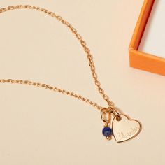 Our Personalized Mini Gemstone Heart Necklace is a touch of love for those that fill your heart with joy. The perfect personalized gift for a new mum, each necklace features a colorful gemstone to pair alongside a heart charm, hand-engraved with the name and birth date of their new arrival.&nbsp;Please note that there may be slight variations between each gemstone due to its origins.18K Champagne Gold Plated or 925 Sterling SilverMini Flat Heart: 0.4 x 0.4Mini Gemstone: 0.15 x 0.15 x 0.1Secure clasp fasteningCharms are removable from this chain and can be worn on all Merci Maman chain lengthsHand-engraved in our Paris workshopSent with love in a complimentary gift boxPlease note that necklaces that have several charms may develop a certain patina, giving it a unique style.Any slight va Personalized Heart Pendant Charm Necklace With Birthstone, Personalized Birthstone Charm Necklace With Heart Pendant, Birthstone Charm Necklace With Heart Pendant, Valentine's Day Birthstone Charm Necklace Keepsake, Heart Cut Birthstone Necklace For Keepsake, Valentine's Day Keepsake Birthstone Charm Necklace, Mother's Day Birthstone Necklace With Heart Charm, Mother's Day Personalized Birthstone Necklace With Heart Charm, Double Heart Birthstone Charm Necklace For Gift