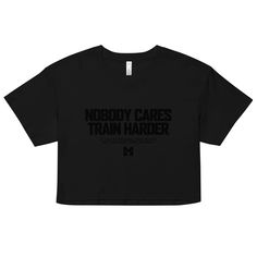 "Train Harder" Crop Top by Motiversity.Showcase your dedication and style with our "Nobody Cares, Train Harder" crop top. Perfect for the gym or a casual day out, this top will keep you motivated and looking fabulous. Order yours today and wear your determination with pride!This crop top is made of 100% combed cotton, which makes the shirt extremely soft and more durable than regular cotton shirts. The relaxed fit and dropped shoulders ensure comfortable wear, while the cropped length makes it p Moisture-wicking Crew Neck Crop Top For Sports, Moisture-wicking Crew Neck Sports Crop Top, Sporty Logo Print Crop Top For Streetwear, Cropped Cotton Sports Bra For Workout, Cotton Sports Bra For Workout, Moisture-wicking Crew Neck Crop Top For Workout, Black Athleisure Cropped T-shirt For Workout, Casual Moisture-wicking Crop Top For Sports, Casual Sports Crop Top With Letter Print