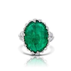 Gemstone: 18.95ct Muzo Emerald, 1.36cts of G-H Color WhiteDiamonds (114pcs)Metal: 18K Gold, 11.35 GramsColors: WhiteMeasurements:Size: 7, Resizable Emerald Bracelets, Emerald Necklaces, Indian Ring, Sunburst Ring, Emerald Cabochon, Indian Rings, Emerald Diamond Earrings, Pear Diamond Rings, Emerald Diamond Ring