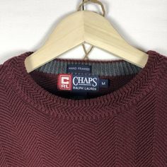 Stay warm and stylish with this classic Chaps Ralph Lauren men’s pullover knit sweater. Crafted in a rich brown color, this medium-sized sweater is perfect for layering during colder months or wearing on its own for a casual yet polished look. With a durable knit pattern, this sweater is both comfortable and long-lasting. • Brand: Chaps by Ralph Lauren • Size: Medium • Color: Brown • Material: Soft and durable knit fabric • Condition: Very Good Used Condition with minimal signs of wear • Fit: Cl Brown Crew Neck Polo Sweater For Winter, Classic Brown Sweater For Layering, Classic Brown Sweatshirt For Fall, Brown Classic Sweatshirt For Fall, Casual Brown Crew Neck Polo Sweater, Classic Brown Fall Sweatshirt, Classic Brown Cable Knit Sweater, Brown Knit Sweater With Ribbed Collar, Ralph Lauren Fall Sweater With Ribbed Cuffs