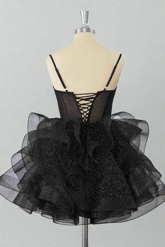 Experience the perfect balance of elegance and style with our Black Straps A-Line Ruffle Homecoming Dress. Featuring delicate spaghetti straps, a flattering corset bodice, and a gorgeous a-line tiered skirt, this dress will make you stand out at any event. The lace-up back adds a touch of sophistication, making it the perfect choice for any special occasion. ♡ SKU: FV12831 ♡ Fabric: Tulle ♡ Silhouette: A-Line ♡ Back Style: Lace-Up ♡ Embellishment: Ruffles ♡ Length: Above Knee ♡ Fully lined & Bui Tulle Wedding Dress Mermaid, Velvet Homecoming Dress, Feather Homecoming Dress, Floral Homecoming Dresses, Tight Homecoming Dress, Bodycon Dress Homecoming, Sweetheart Homecoming Dress, Sneaker Ball, Ruffle Prom Dress