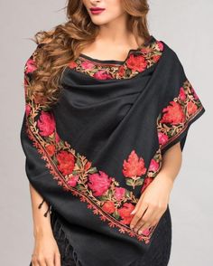 Our Embroidered Wool Shawl features exquisite embroidery on fine, soft wool. This stunning embroidered pure wool shawl showcases the intricate embroidery traditions in rich earthen tones on a black base. COLOR Black Multicolor DIMENSIONS 28" x 72" Embroidered Dupatta For Fall, Fall Embroidered Pashmina Shawl, Embroidered Pashmina Shawl For Fall, Fall Embroidered Dupatta, Traditional Black Fabric With Floral Embroidery, Winter Festive Embroidered Scarves, Traditional Pashmina Dupatta For Fall, Traditional Floral Embroidered Shawl For Winter, Traditional Winter Shawl With Floral Embroidery