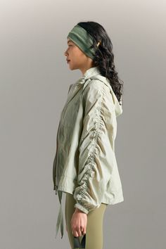 Classic wind breaker jacket with its signature loose and comfortable fit wear. It is best to style with legging to complete the unique outfit. Oversized Hooded Spring Windbreaker, Oversized Hooded Windbreaker For Spring, Oversized Windbreaker For Spring Outdoor, Spring Outerwear With Elastic Cuffs And Relaxed Fit, Spring Outerwear With Relaxed Fit And Elastic Cuffs, Relaxed Fit Spring Outerwear With Elastic Cuffs, Spring Outdoor Windbreaker With Drawstring, Stretch Windbreaker For Streetwear In Fall, Spring Outerwear With Drawstring Hood And Relaxed Fit