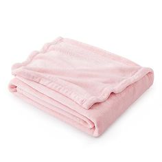 a pink blanket folded on top of each other