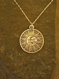 This Moon Sun Astrology pendant is 14K Gold. The included chain is a 14K Gold chain. You may choose 16, 18 or 20 inch at the same price. Other length available at sightly higher prices. This Moon Sun pendant measures 1 1/16" tall by 15/16" across. I hand cast all my pieces using the lost wax casting method. Please ask your needs. You may call me with questions, often I am out so please use my machine. 831-476-3176. Satisfaction Guaranteed! I send items USPS First Class unless otherwise directed. Celestial 14k Gold Coin Pendant Jewelry, Celestial Engraved 14k Gold Necklace, Symbolic 14k Gold Necklace With Moon Charm, Engraved Celestial 14k Gold Necklace, 14k Gold Celestial Sun And Moon Jewelry, 14k Gold Celestial Jewelry With Sun And Moon Design, 14k Gold Sun And Moon Pendant Necklace, 14k Gold Sun And Moon Design Jewelry, 14k Gold Pendant Necklaces With Sun And Moon Design