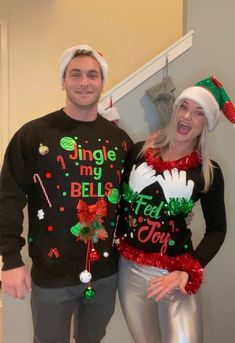 a man and woman dressed up in ugly christmas sweaters