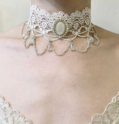 Welcome to LilyBlueUnicorn!  ❀ This listing is for one lace ribbon choker. ❀ The choker measures around 11.5 inches / 29.5 cm long and 2 iches / 5 cm wide (lace portion). ❀ The choker finishes with lobster clasp closure and a 3.5-inch extension chain.  ❀ Handmade and shipped from Macao via Air Mail ❀ Please note that all accessories are carefully handmade to order. All items will be made as similar to the display photo as possible but may vary slightly due to the handmade nature of the product. ❀ Please double check and make sure your shipping address is correct and complete to avoid delays. ❀ Please read my shop announcement, shipping policies and FAQs and make sure to check the estimated delivery date(s) to your country BEFORE placing an order. ❀ Please send me a message if you have any Vintage White Choker For Gift, Vintage Lace Choker Jewelry, Vintage Lace Choker As A Gift, Vintage Lace Choker For Gifts, Lace Trim Choker Jewelry Gift, White Lace Choker, Victorian Choker, Lace Choker Necklace, Ribbon Choker